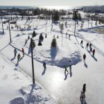 A Top Holiday Spot With A 1,000-foot Riverfront Ice Trail”